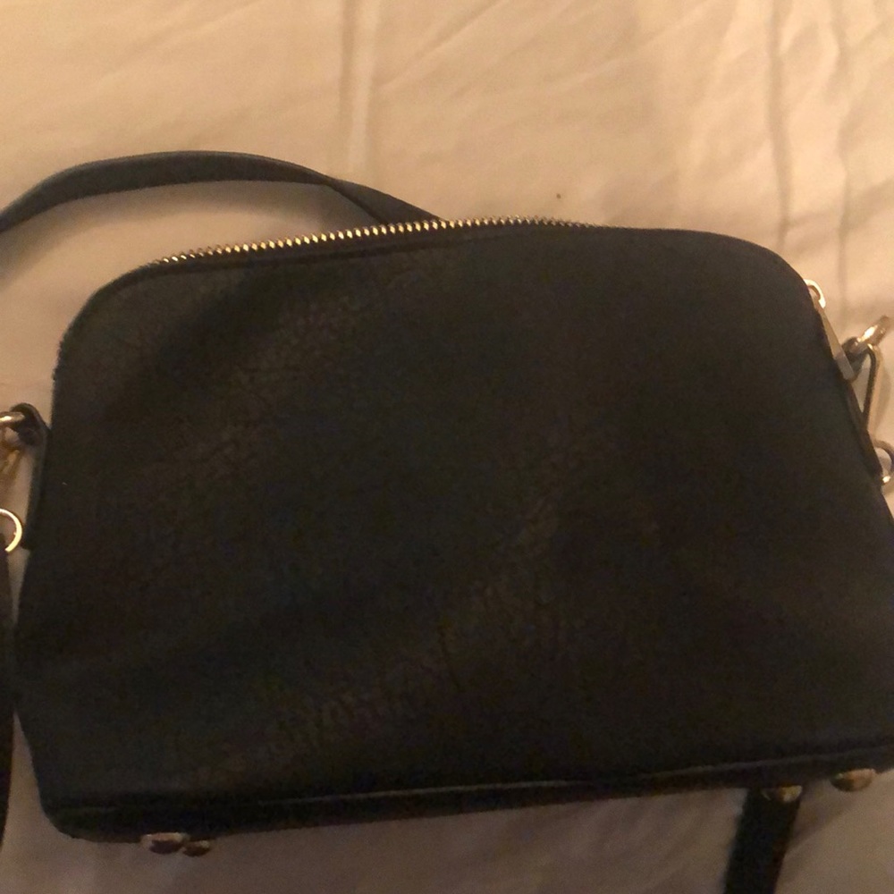 Small black shoulder bag with optional short strap